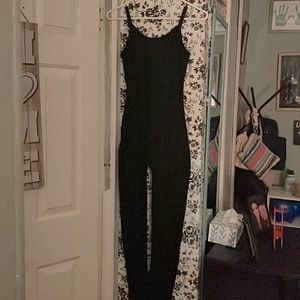 Sleeveless black catsuit never worn